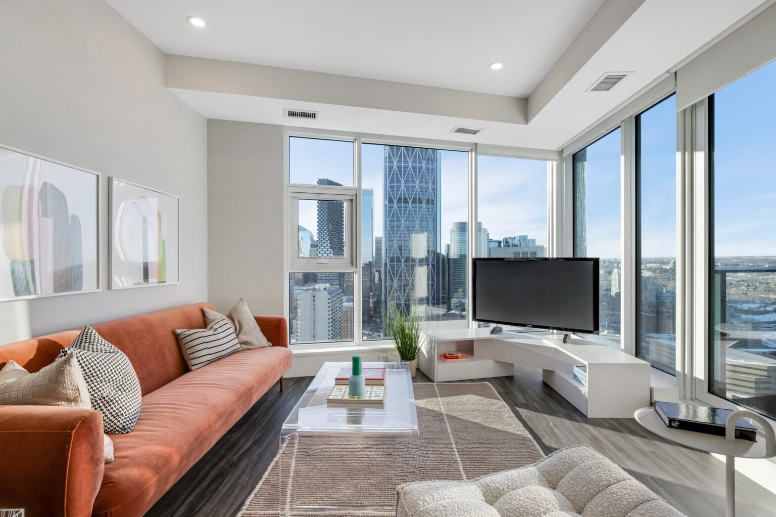 The internal view of Living room at Arris Residence,2024. Spacious, highly livable suites with vertically extended windows and spacious balconies or terraces in every home that maximize stunning river and city views